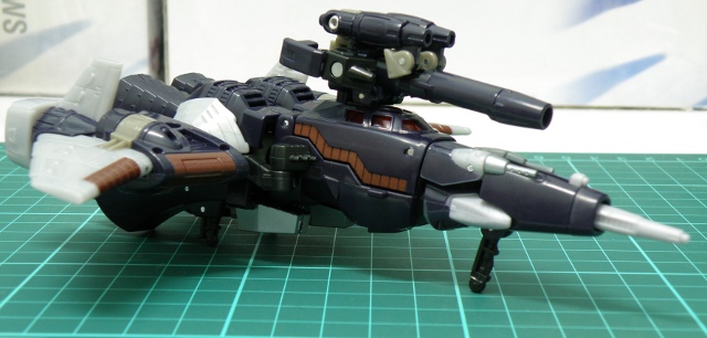 Cyclonus cybertronian jet with gun attached.